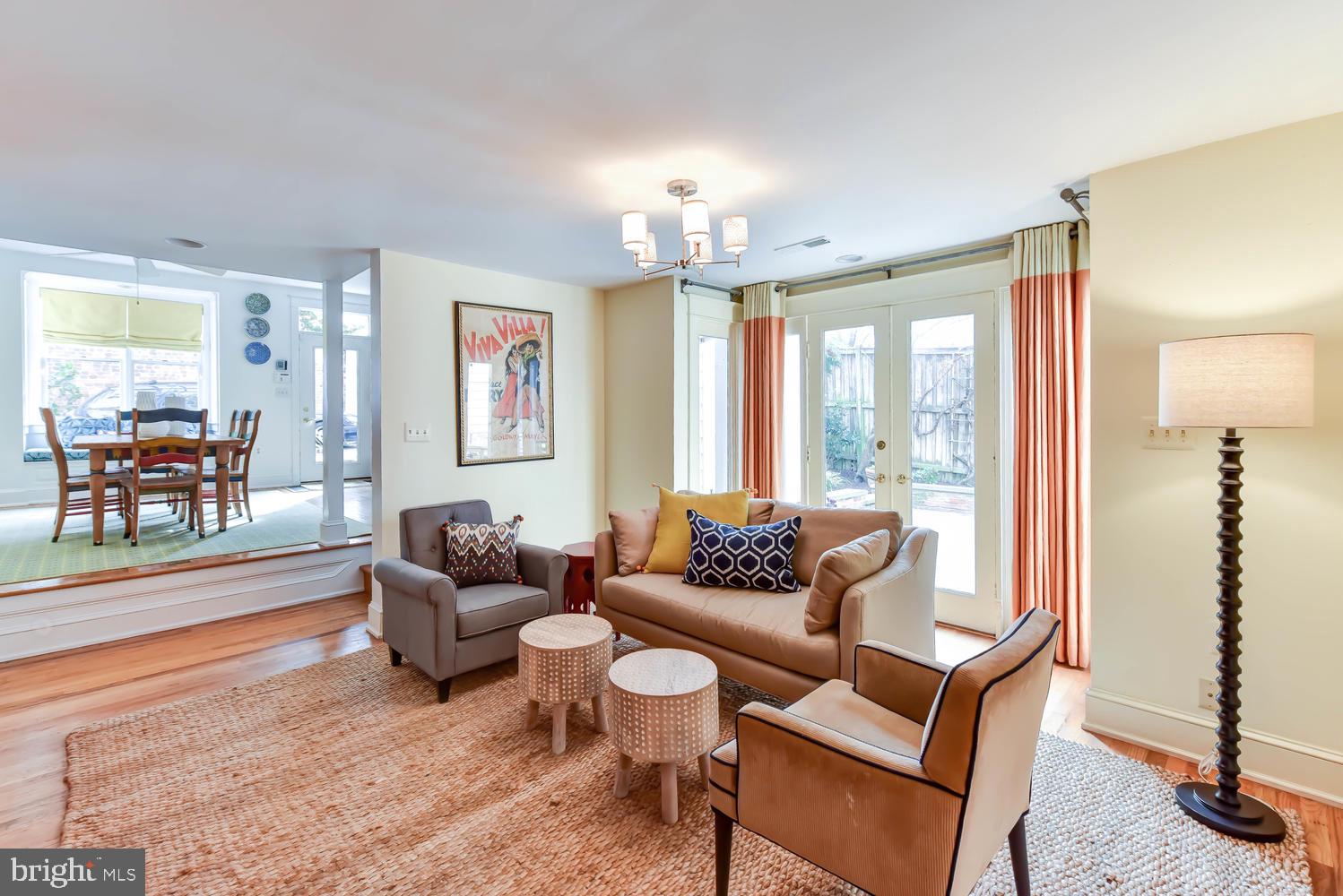 645 E Street Southeast Washington, DC 20003 - Photo 15 of 57 a living room with furniture and a large window