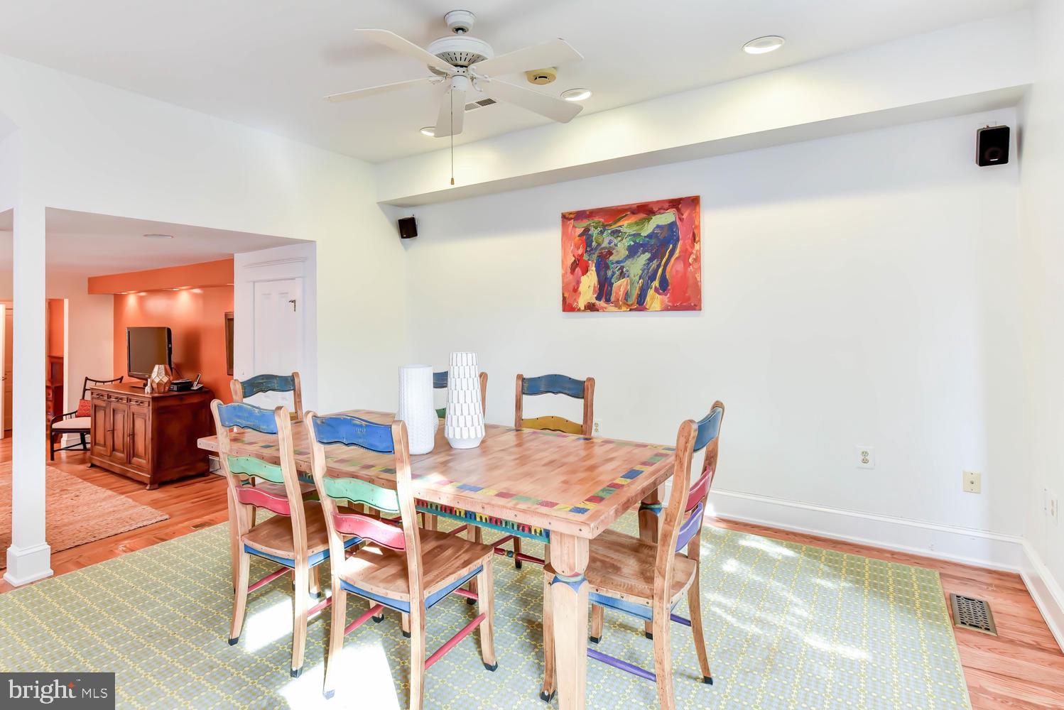 645 E Street Southeast Washington, DC 20003 - Photo 23 of 57 a dining room with furniture and wooden floor