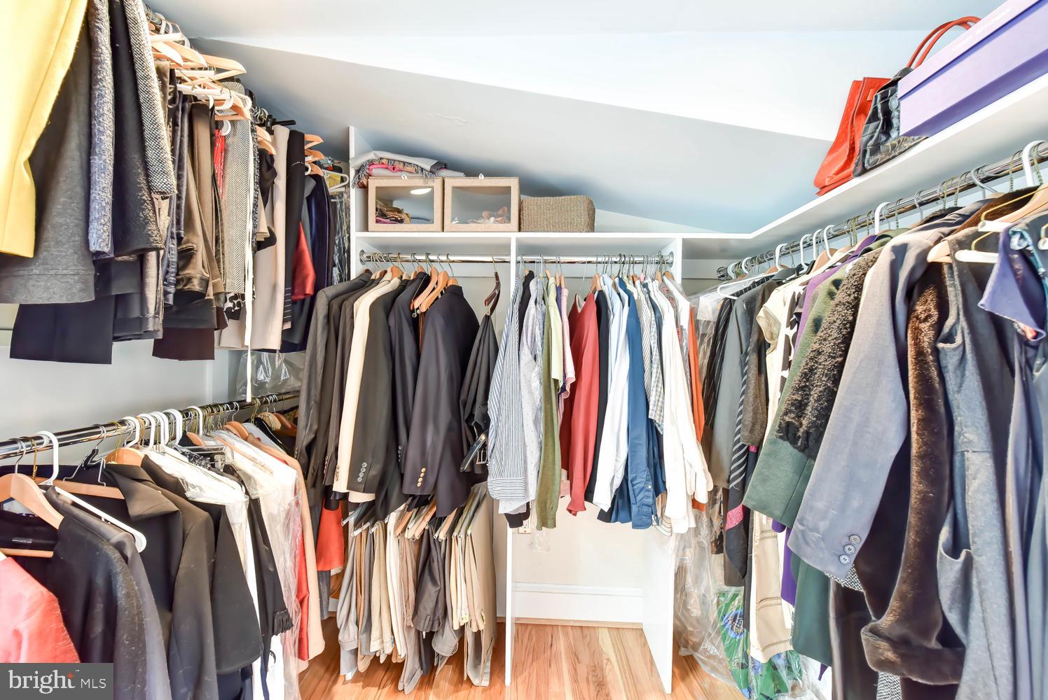 645 E Street Southeast Washington, DC 20003 - Photo 31 of 57 a view of walk in closet with clothes and shoes