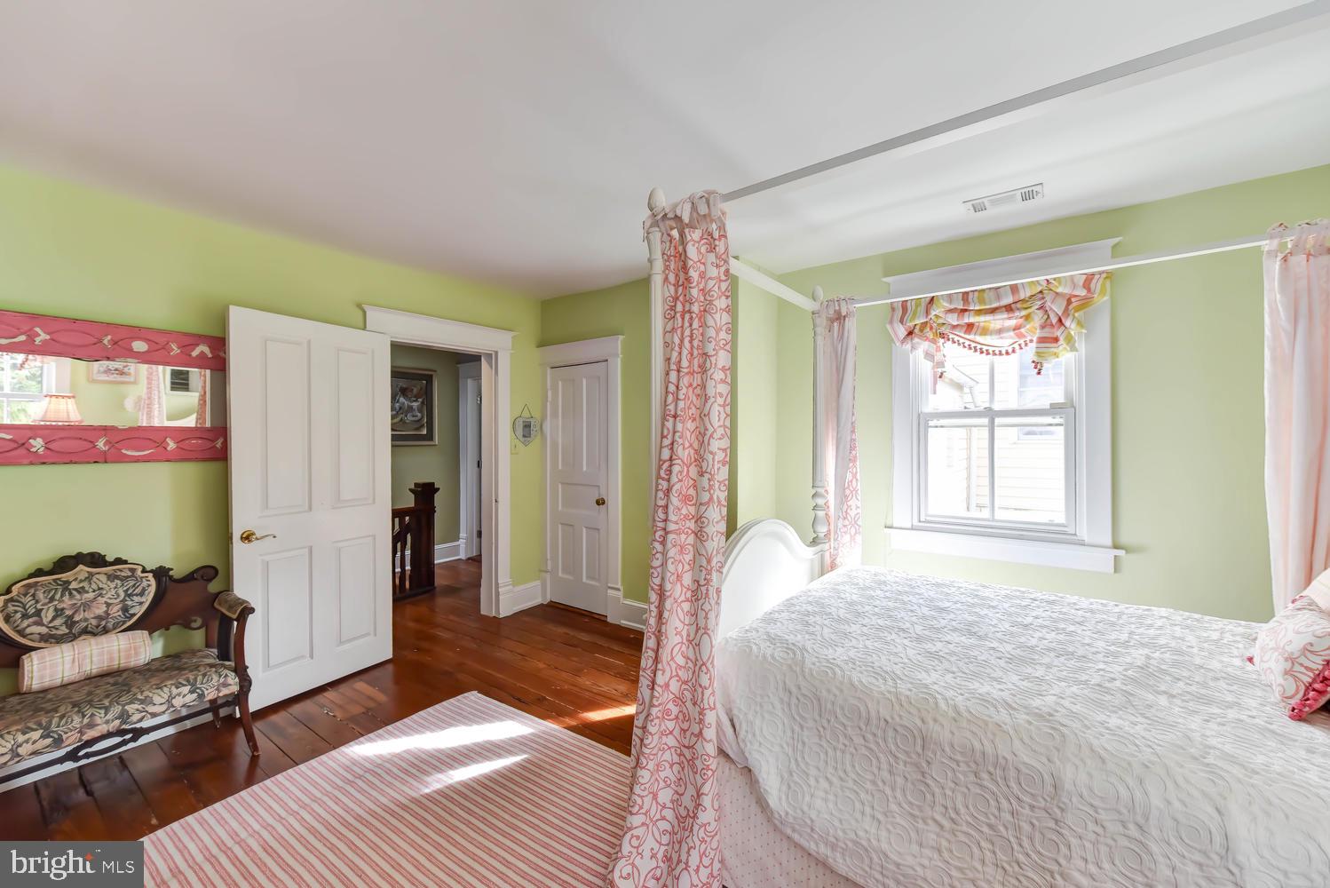 645 E Street Southeast Washington, DC 20003 - Photo 37 of 57 a spacious bedroom with a bed and a window