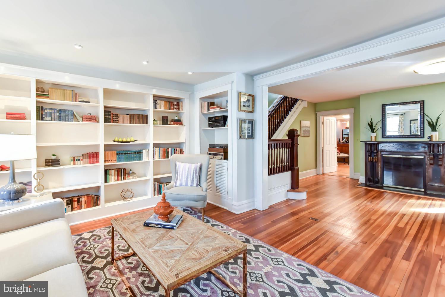645 E Street Southeast Washington, DC 20003 - Photo 5 of 57 a living room with furniture and a fireplace