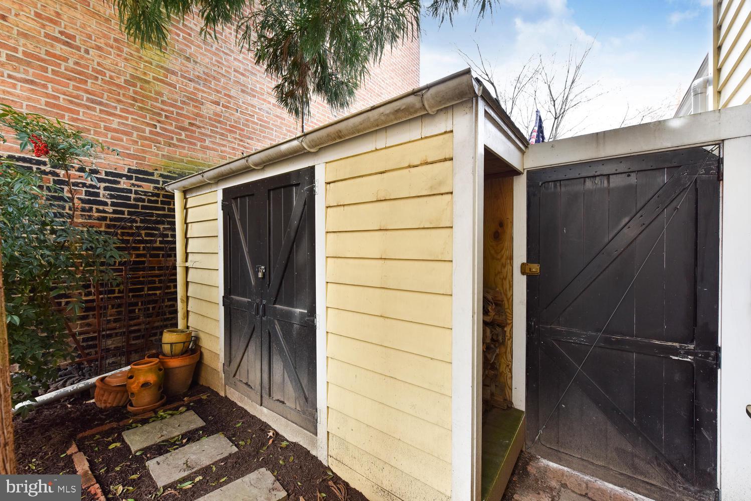 645 E Street Southeast Washington, DC 20003 - Photo 45 of 57 Large bike shed, solar panel mechanism to right