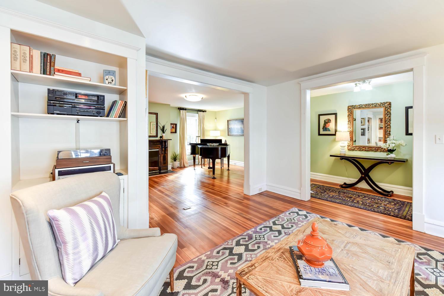 645 E Street Southeast Washington, DC 20003 - Photo 6 of 57 a living room with furniture and a table