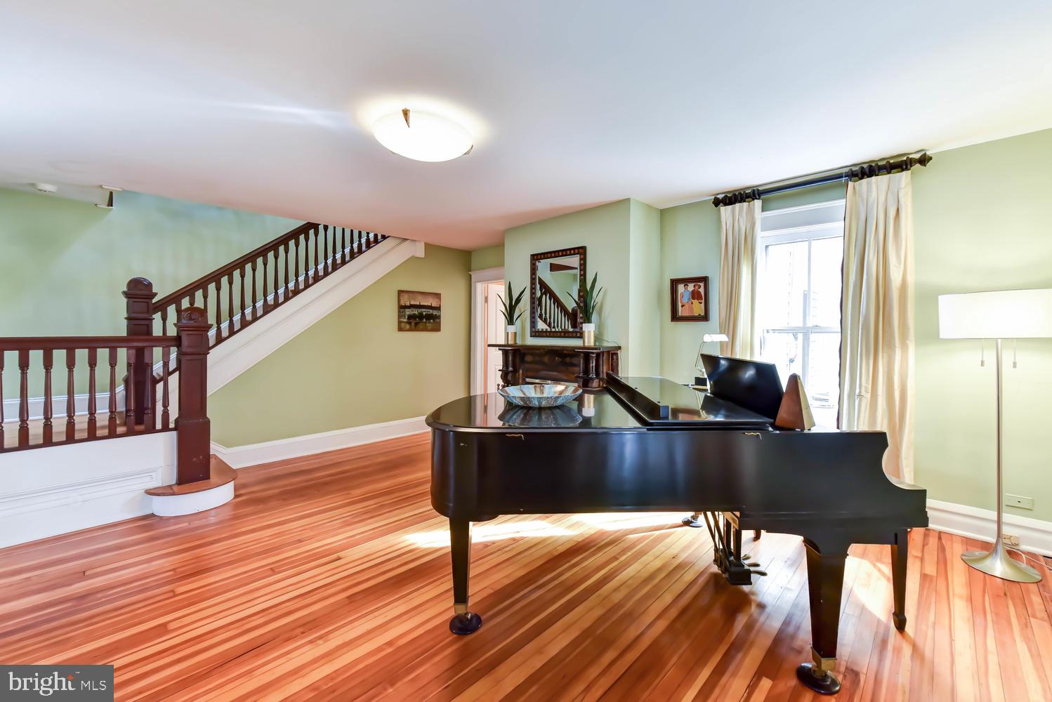 645 E Street Southeast Washington, DC 20003 - Photo 8 of 57 Music room/double living room w/ heart pine floors