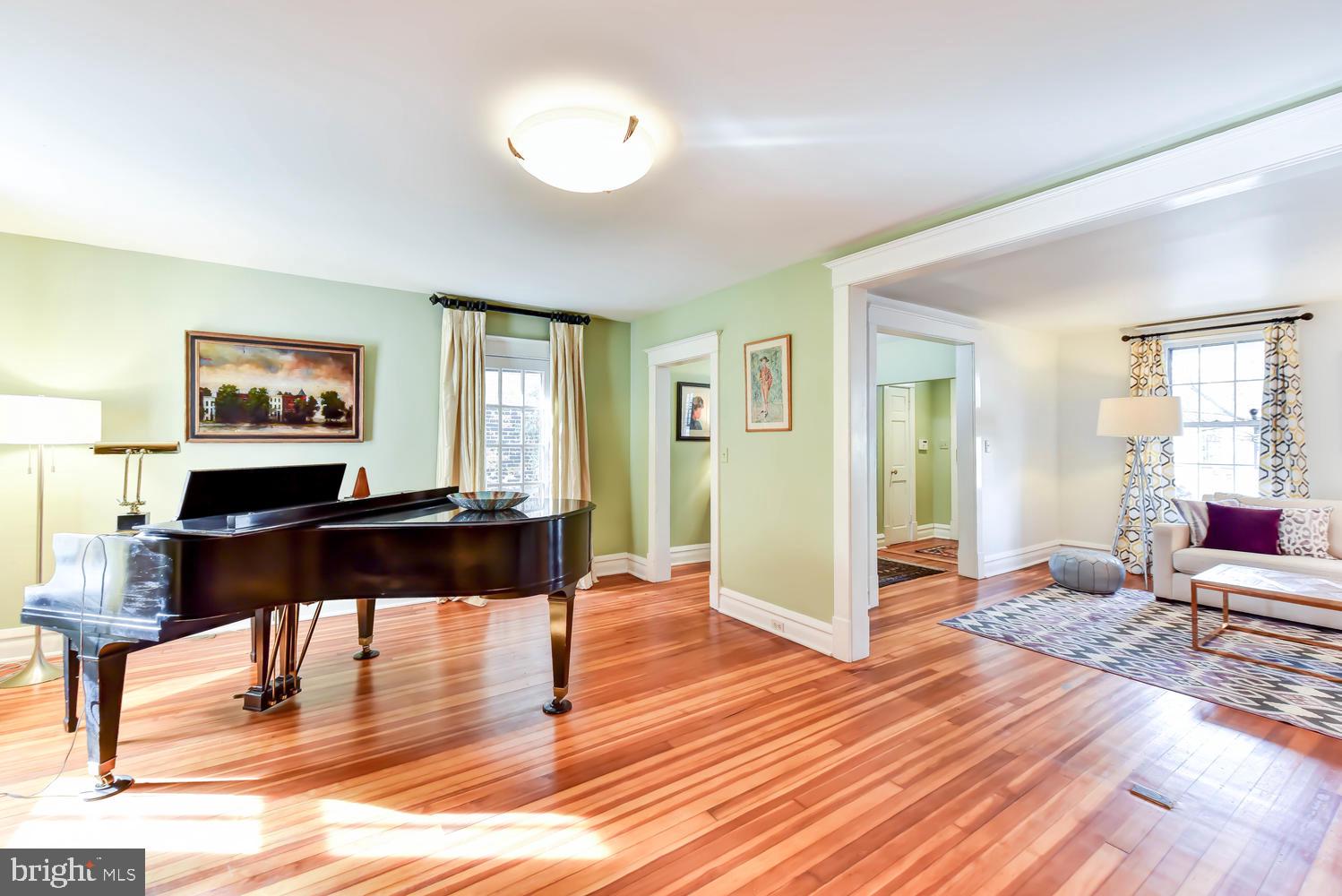 645 E Street Southeast Washington, DC 20003 - Photo 9 of 57 a living room with furniture and a wooden floor