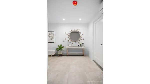 a picture of a room with a white wall and a white wall