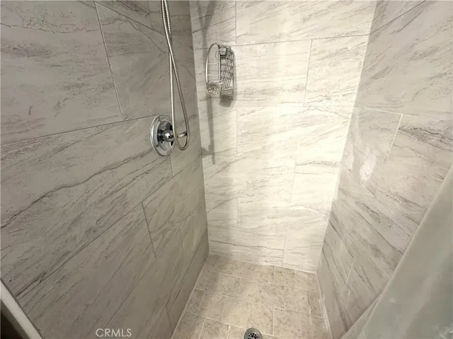 a view of a house with swimming pool and a yard