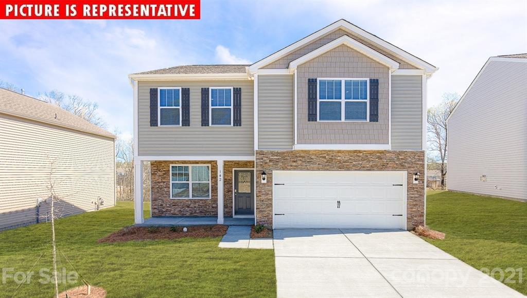 106 Sierra Road Mooresville, NC 28117 - Photo 1 of 32 a front view of a house with a yard