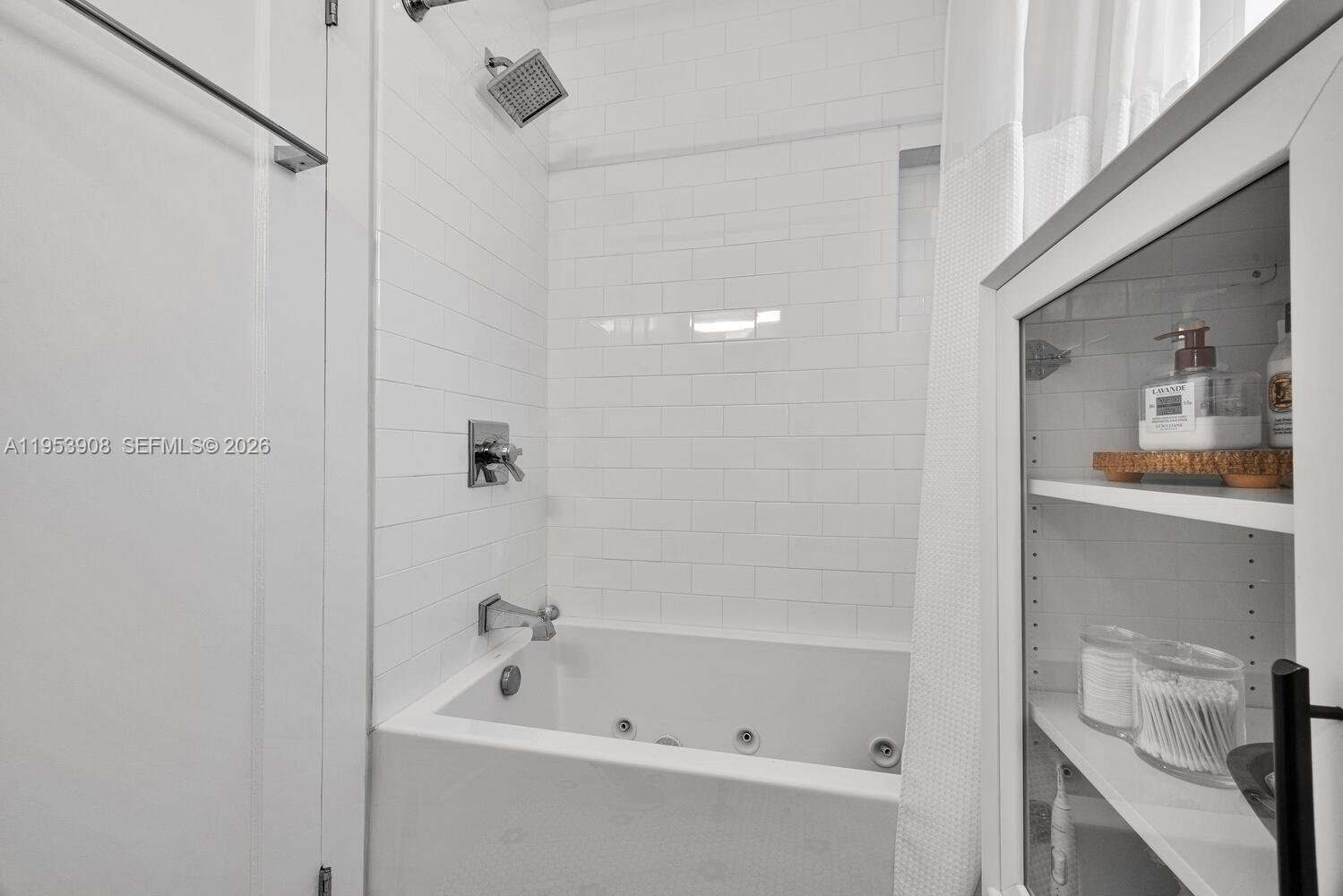 2431 Southwest 22nd Terrace Miami, FL 33145 - Photo 11 of 22 a bathroom with a bathtub and shower