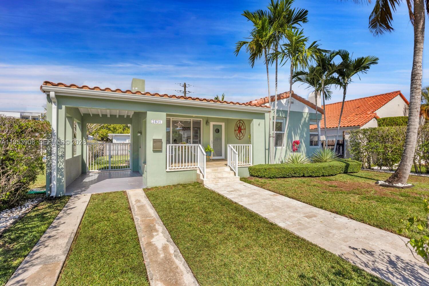2431 Southwest 22nd Terrace Miami, FL 33145 - Photo 15 of 16 a front view of a house with garden