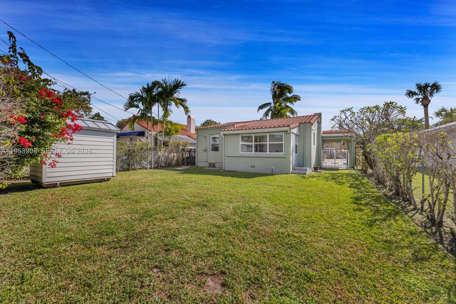 2431 Southwest 22nd Terrace Miami, FL 33145 - Photo 15 of 22 a view of a house with a garden