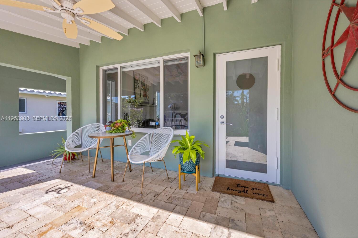 2431 Southwest 22nd Terrace Miami, FL 33145 - Photo 17 of 22 a view of a dinning room with a table and chairs