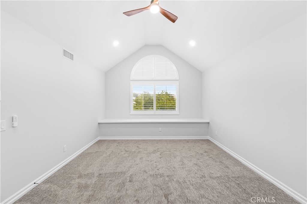 26433 Emerald Dove Drive Valencia, CA 91355 - Photo 13 of 50 an empty room with a window