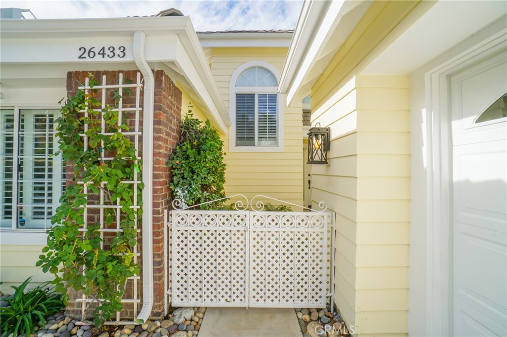 26433 Emerald Dove Drive Valencia, CA 91355 - Photo 44 of 50 a front view of a house with a glass door