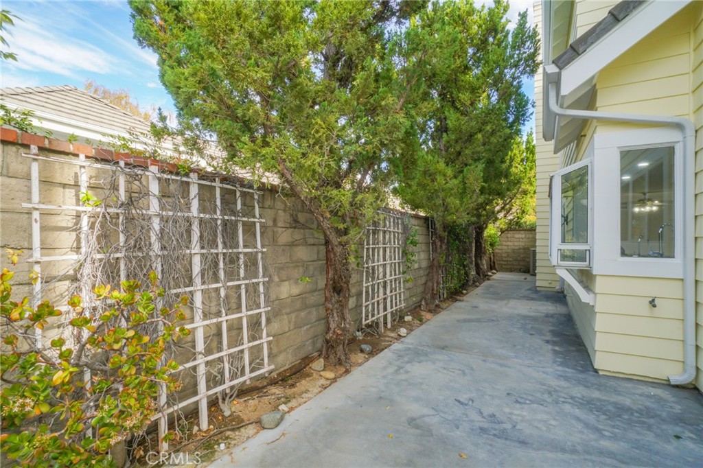 26433 Emerald Dove Drive Valencia, CA 91355 - Photo 46 of 50 a view of a pathway of a house