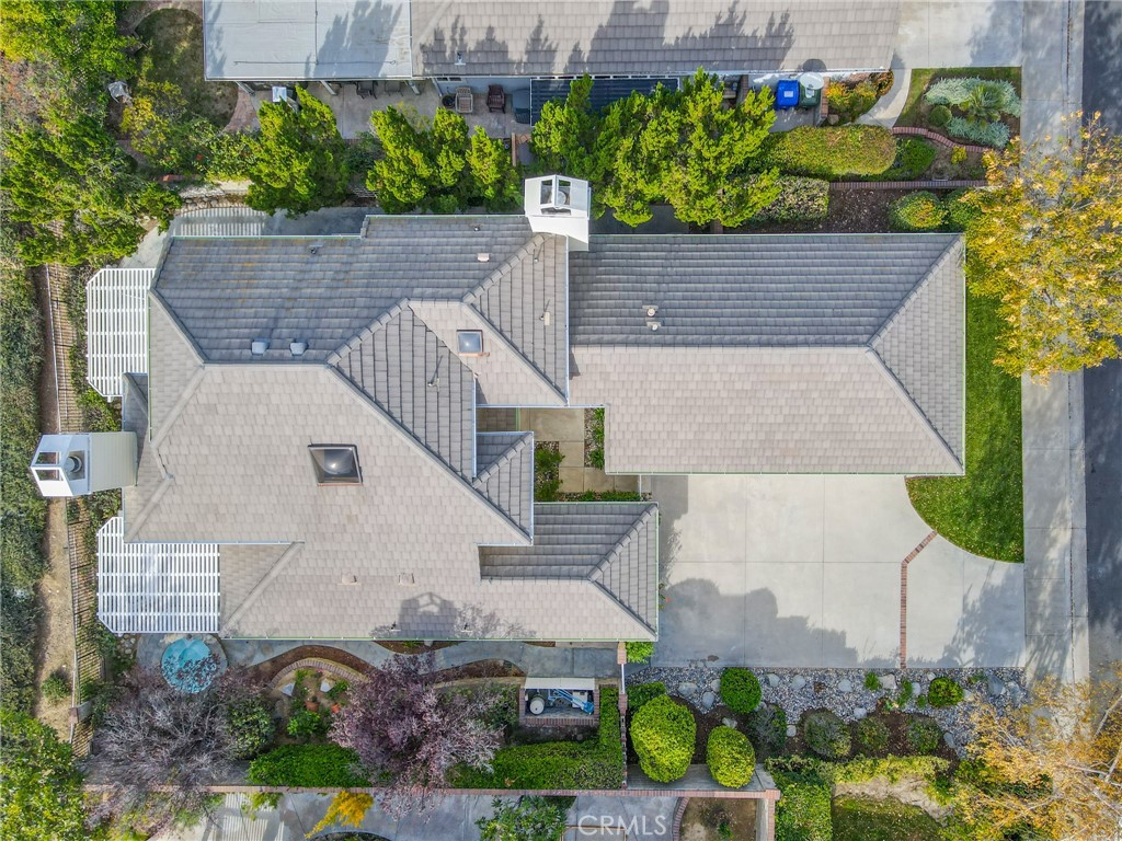 26433 Emerald Dove Drive Valencia, CA 91355 - Photo 48 of 50 an aerial view of a house with a yard and potted plants