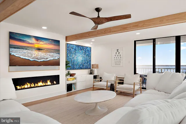 a large kitchen with stainless steel appliances granite countertop a sink a stove and oven