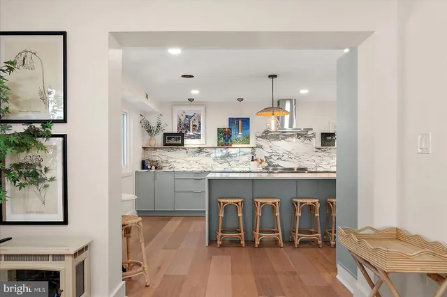 a bed room with two bed and a large window