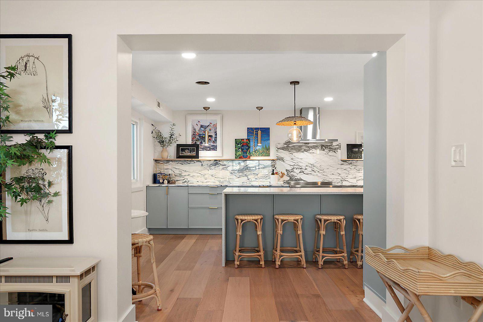 11000 Coastal Highway, Unit 2000 Ocean City, MD 21842 - Photo 16 of 102 a kitchen with stainless steel appliances granite countertop a kitchen island hardwood floor sink and stove