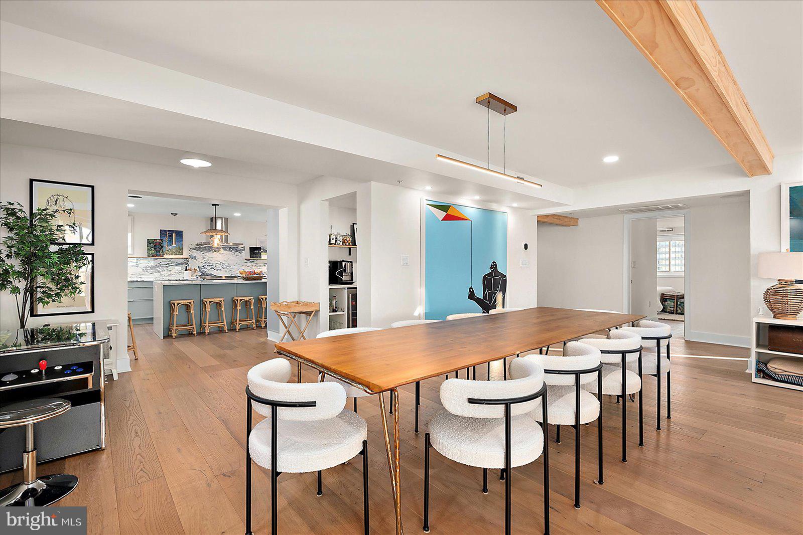 11000 Coastal Highway, Unit 2000 Ocean City, MD 21842 - Photo 29 of 102 a view of a dining room with furniture and wooden floor