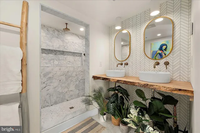 an aerial view of residential building and ocean