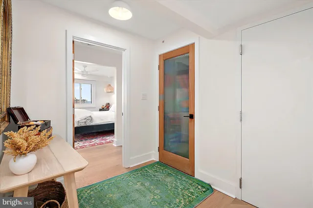 an aerial view of residential building and ocean