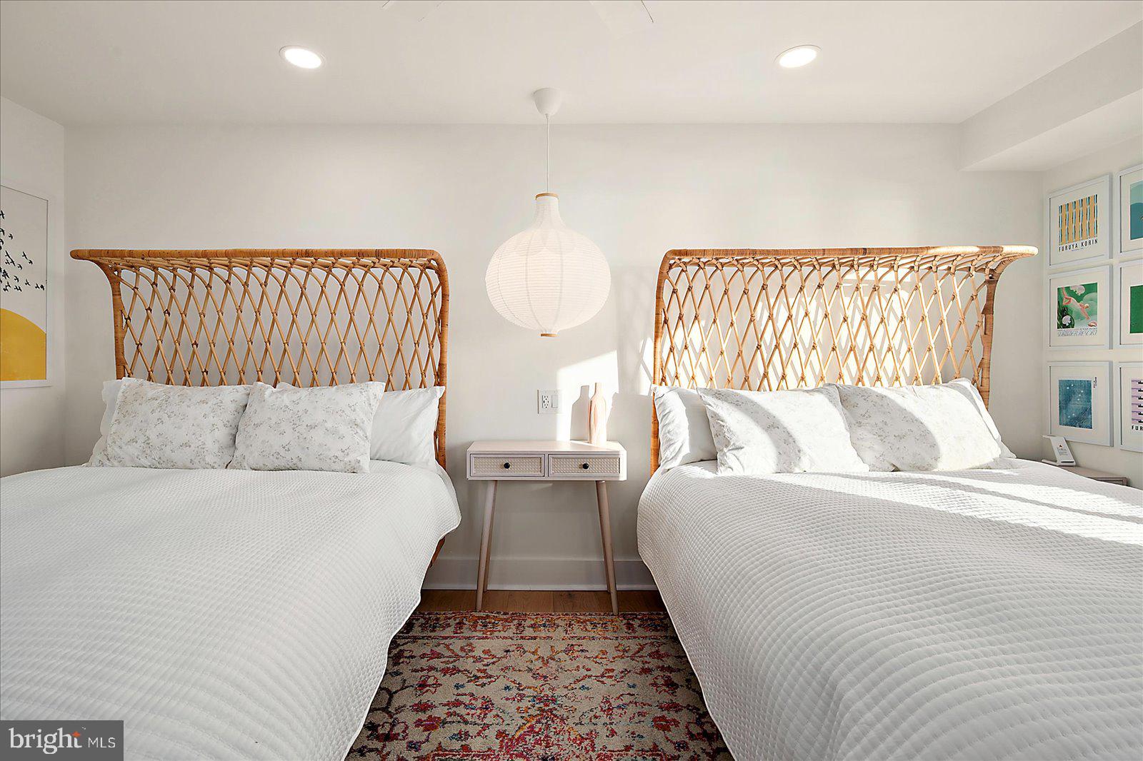 11000 Coastal Highway, Unit 2000 Ocean City, MD 21842 - Photo 66 of 102 a bed room with a bed and a couch