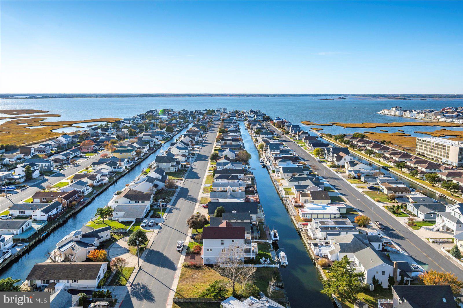 11000 Coastal Highway, Unit 2000 Ocean City, MD 21842 - Photo 76 of 102 an aerial view of residential building and lake