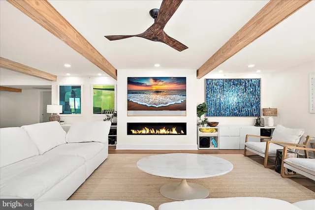 a kitchen with stainless steel appliances granite countertop a sink and a stove top oven