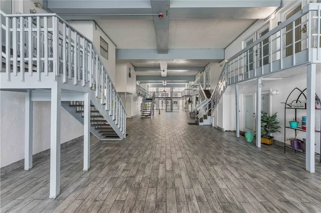 a view of entryway with wooden floor