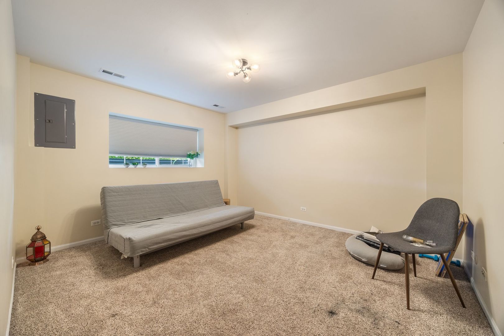 893 Emerald Drive Pingree Grove, IL 60140 - Photo 17 of 18 a living room with furniture and a chair
