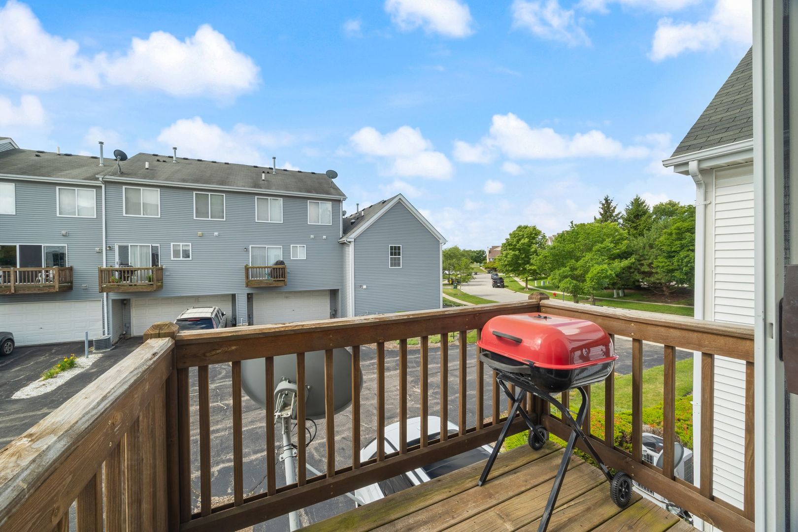 893 Emerald Drive Pingree Grove, IL 60140 - Photo 18 of 18 a view of a house with a porch and furniture