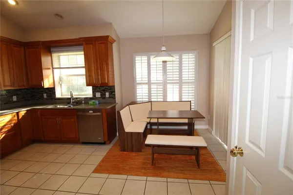a kitchen with a sink and a window