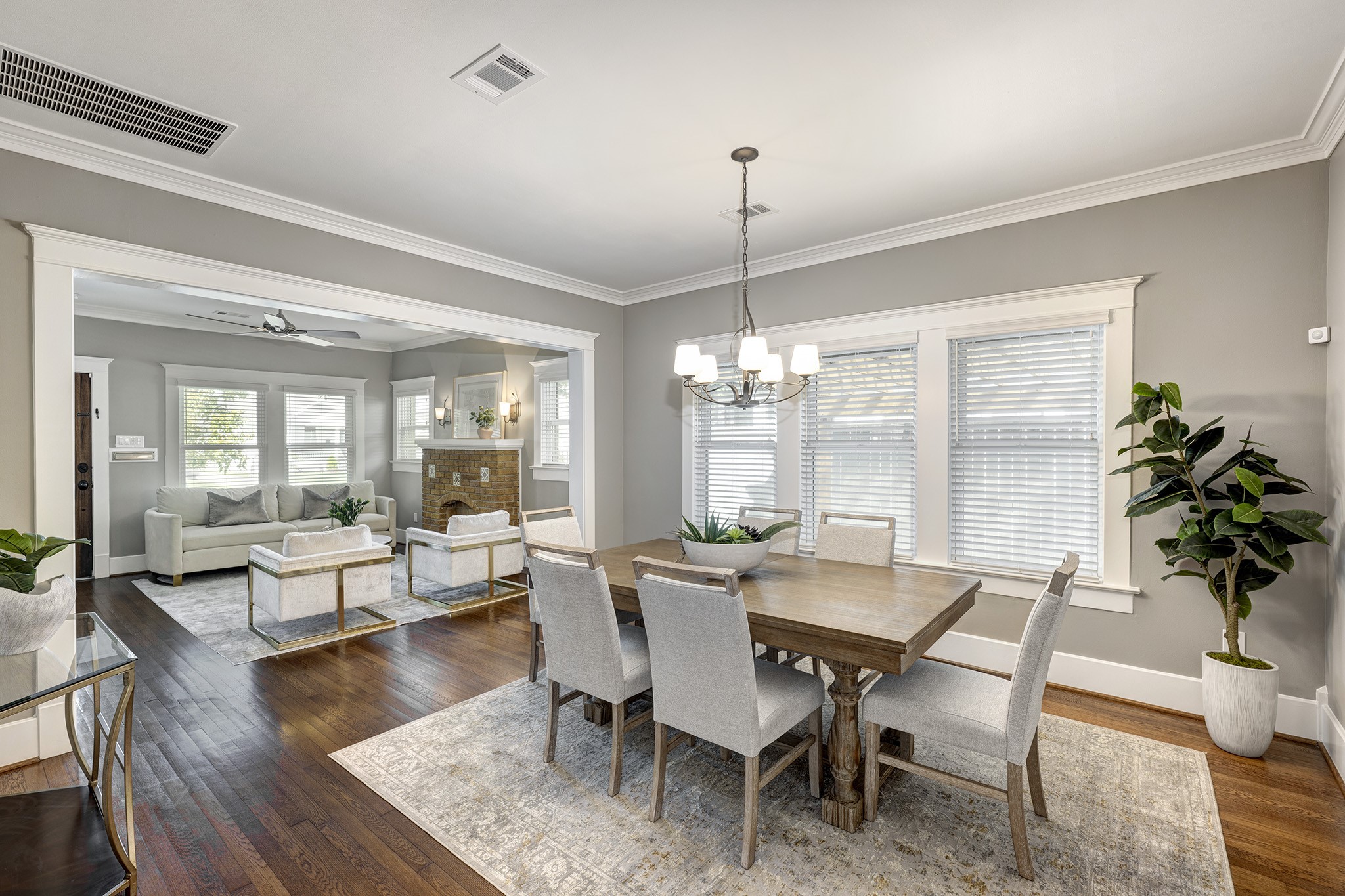 1314 Harvard Street Houston, TX 77008 - Photo 6 of 36 a view of a dining room with furniture wooden floor and chandelier