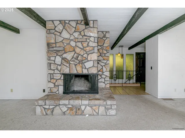 a living room with a fireplace