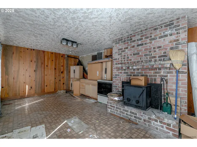 a view of livingroom with furniture and a window