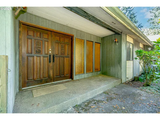 a view of outdoor space and front view of a house