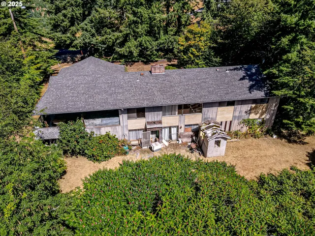 a swimming pool with some trees in the background