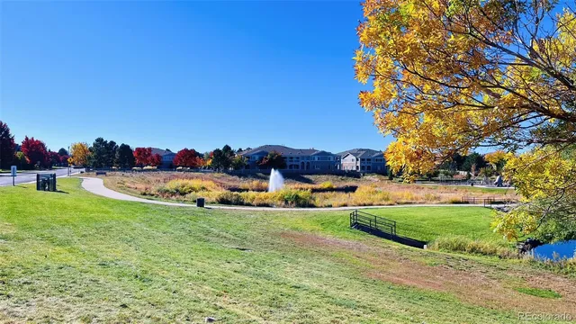 a view of a table and chairs in the garden