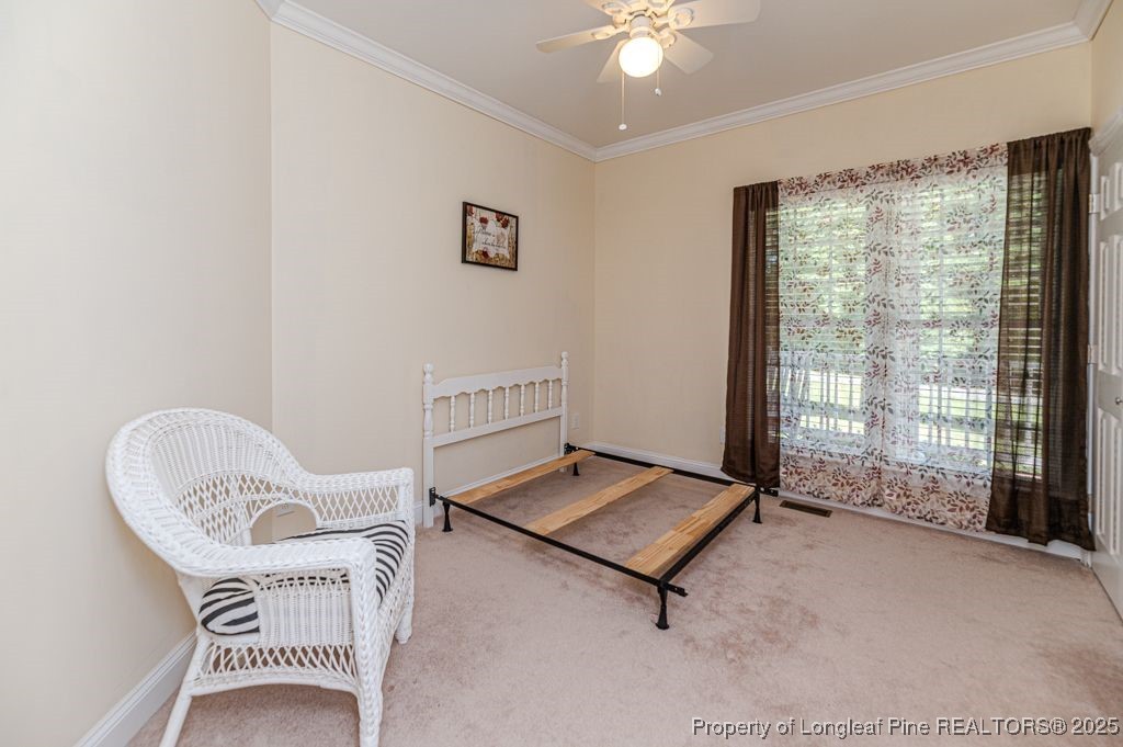 4635 Farrell Road Sanford, NC 27330 - Photo 19 of 30 a living room with furniture and a large window