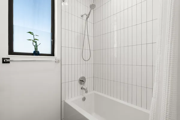 a bathroom with a bathtub