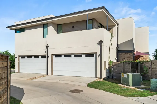 a front view of a house with a garage