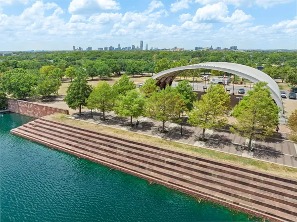 a view of a swimming pool with a yard