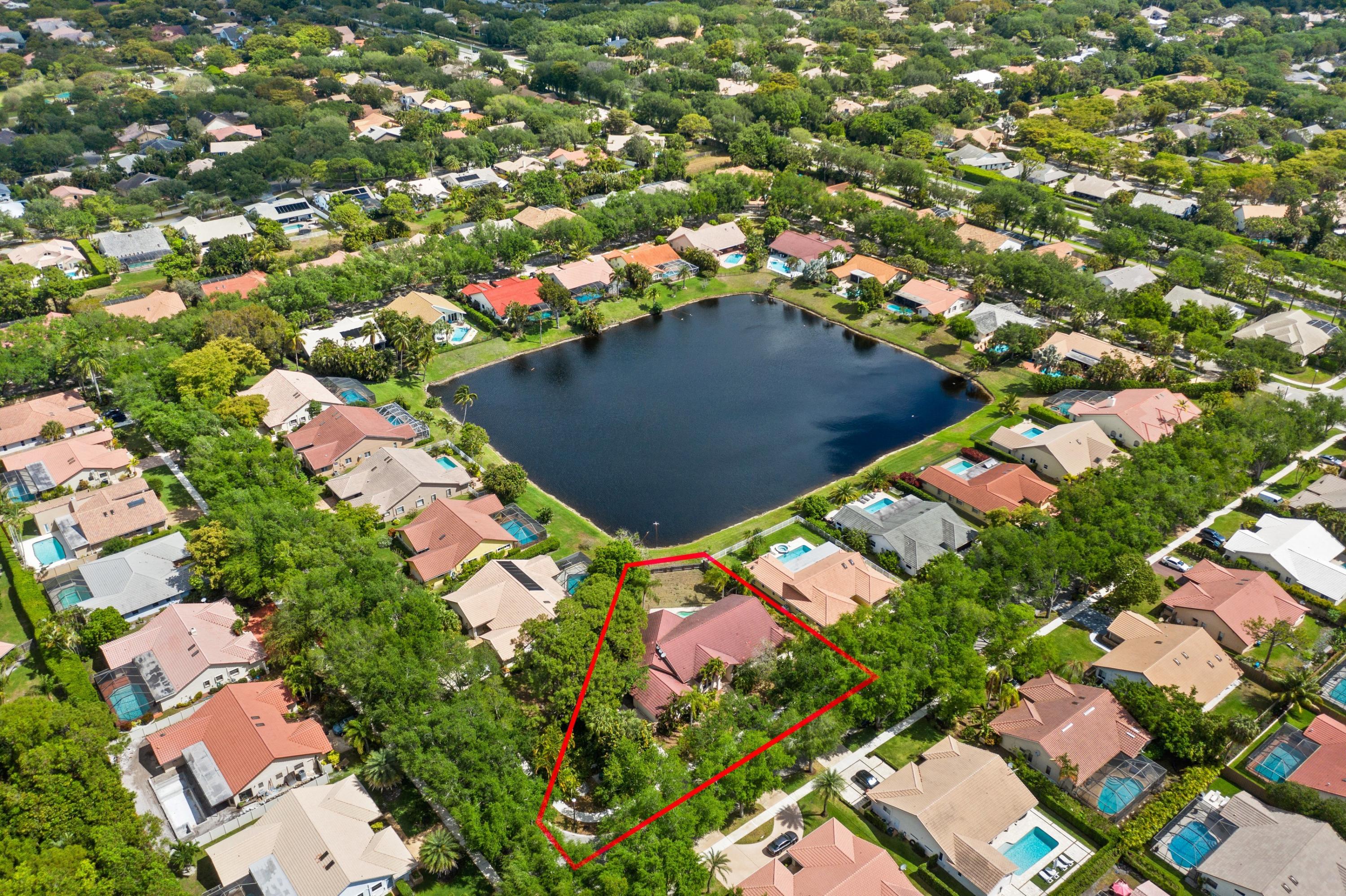 2687 Northwest 39th Street Boca Raton, FL 33434 - Photo 1 of 34 an aerial view of residential houses with outdoor space