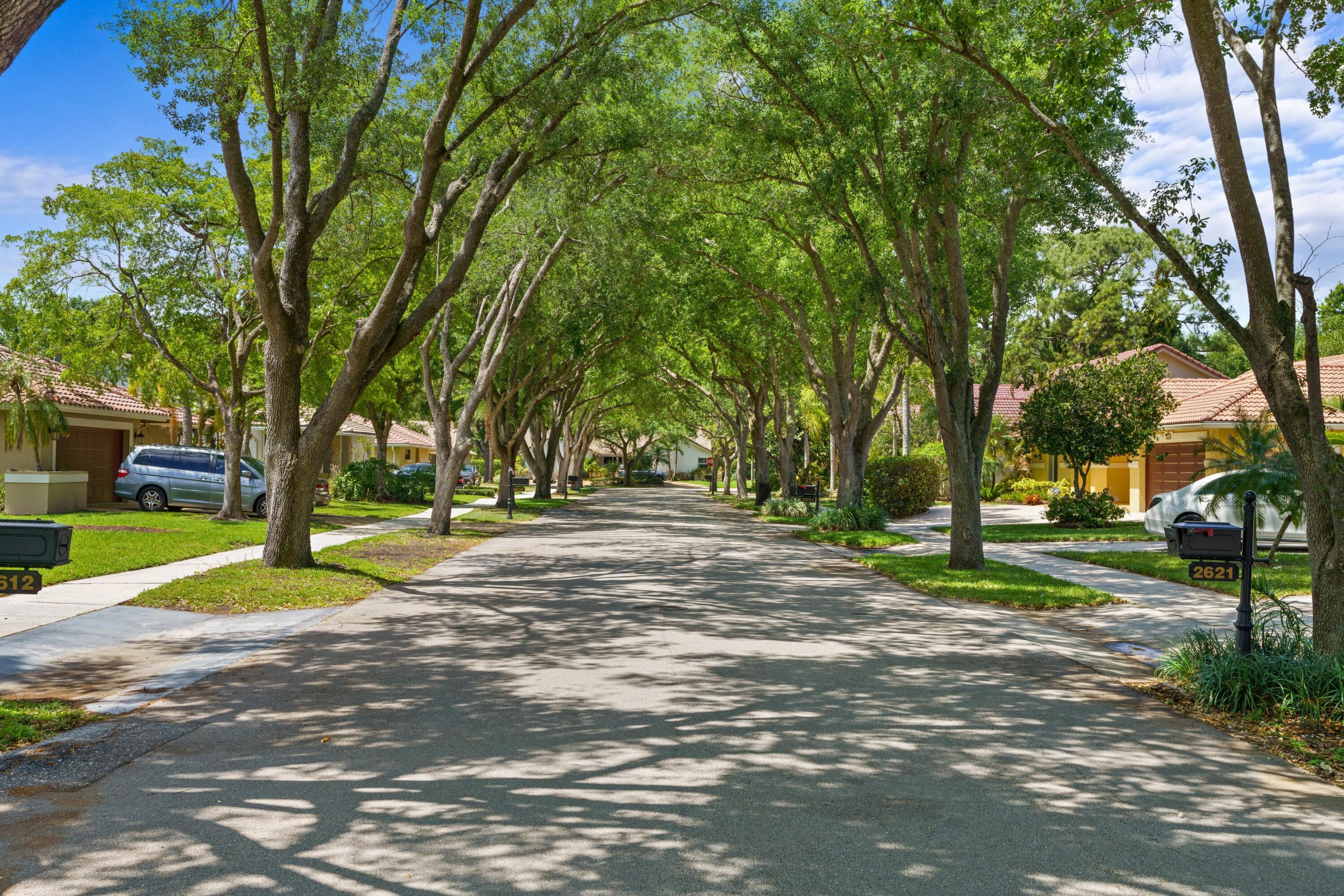 2687 Northwest 39th Street Boca Raton, FL 33434 - Photo 21 of 34 a view of road with trees
