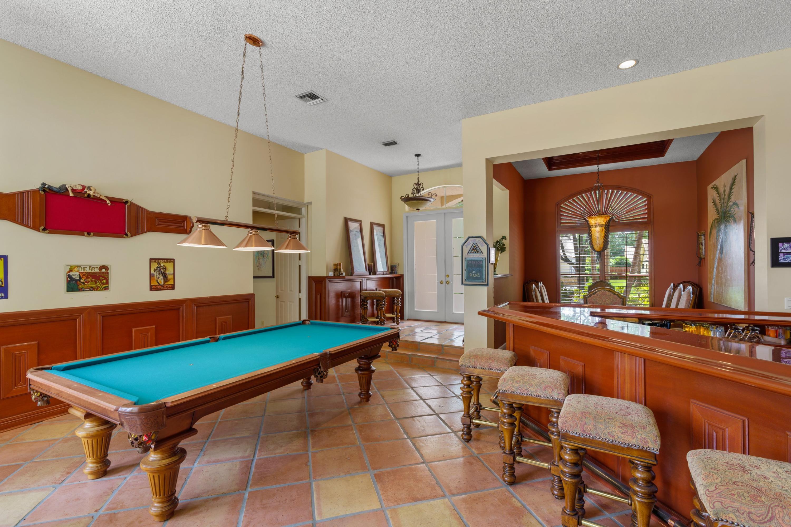 2687 Northwest 39th Street Boca Raton, FL 33434 - Photo 7 of 34 a room with furniture and pool table