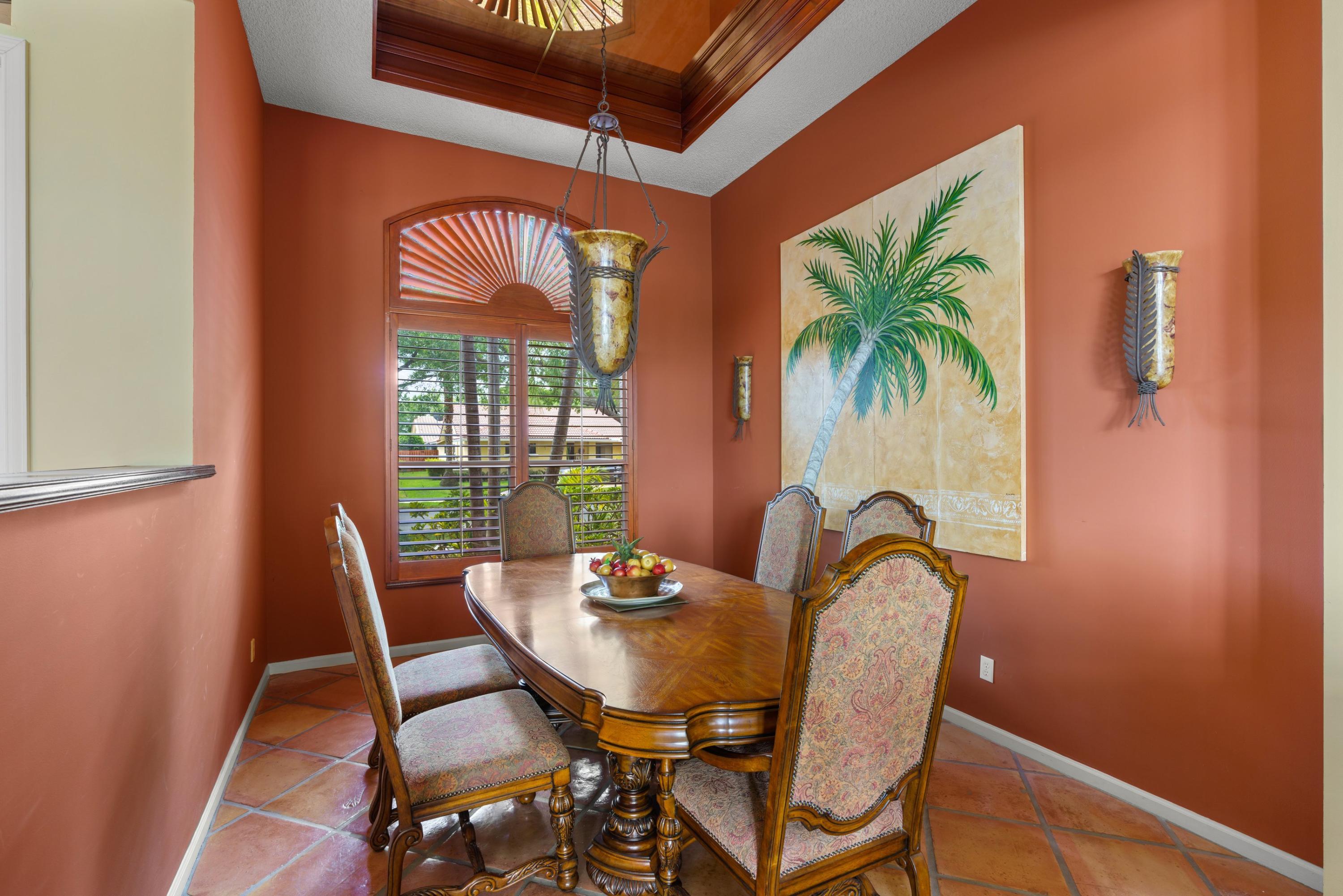 2687 Northwest 39th Street Boca Raton, FL 33434 - Photo 8 of 34 a view of a dining room with furniture window and wooden floor