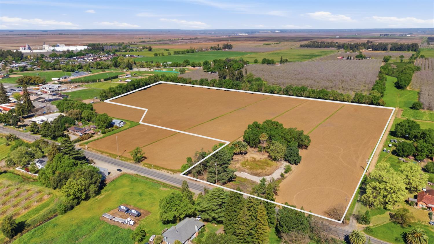 218 B Street Biggs, CA 95917 - Photo 5 of 39 an aerial view of a house with a garden