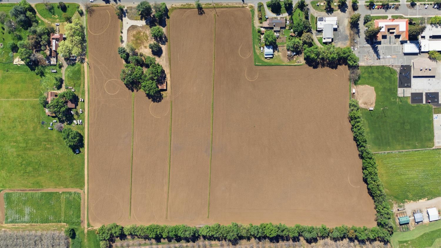 218 B Street Biggs, CA 95917 - Photo 8 of 39 an aerial view of a house with a yard and lake view