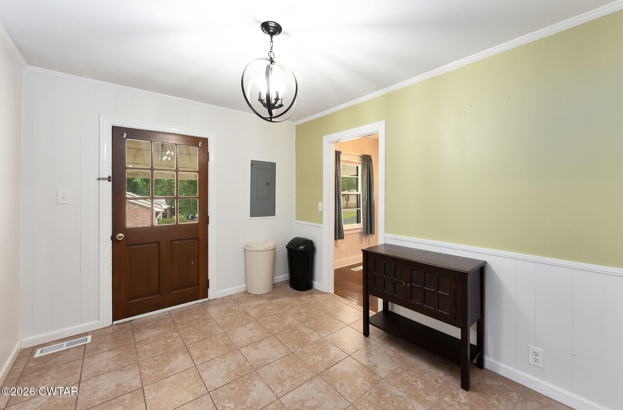 118 Radio Road Jackson, TN 38301 - Photo 2 of 22 a view of a livingroom with furniture and chandelier
